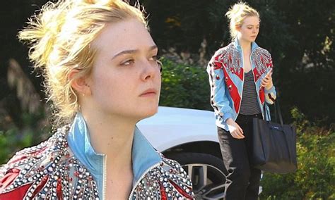 Elle Fanning Wears Jewel Adorned Jacket For Studio Visit