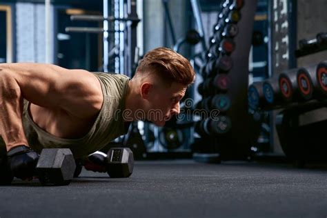 Muscular Man Doing Push Ups Using Dumbbells Stock Image Image Of