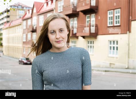 Sweden Vastergotland Gothenburg Portrait Of Young Woman In Old Town