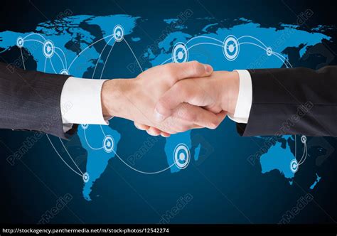 Two Business People Shaking Hands Royalty Free Image 12542274
