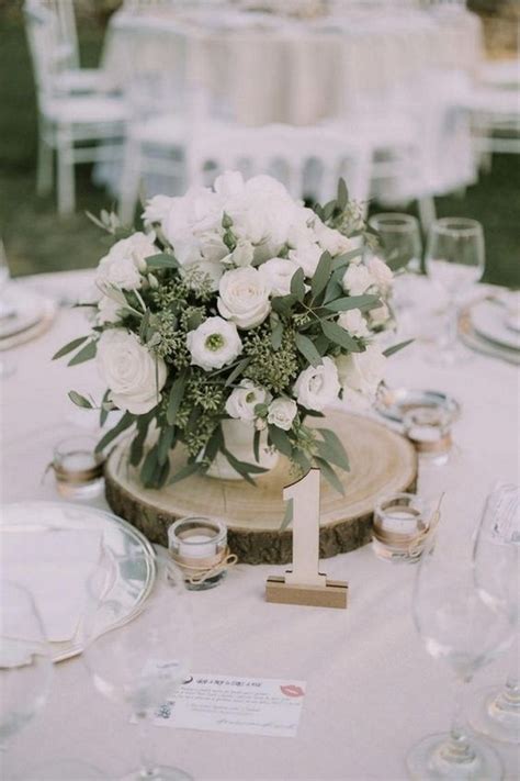 Budget Friendly Rustic Wedding Centerpieces With Tree Stumps