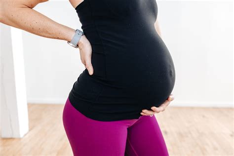 8 Pregnancy Stretches To Relieve Back Pain Video Nourish Move Love