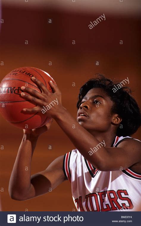 Female High School Basketball Player In Action Shooting A Free Throw
