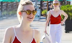 Elle Fanning Looks Hot In Plunging Top As She Goes For A Stroll In