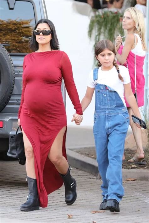 Kourtney Kardashian Flaunts Baby Bump In Skintight Red Dress On Day Out With Babe Penelope