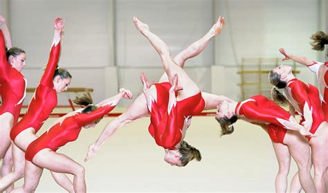 Gymnast Performing A Free Walkover Photograph By Gustoimagesscience