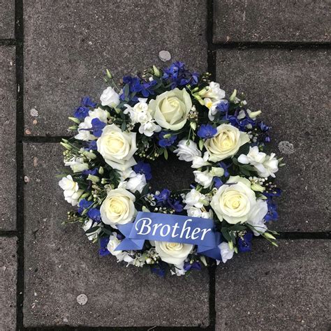 Blue And White Wreath Funeral Flowers Tribute With