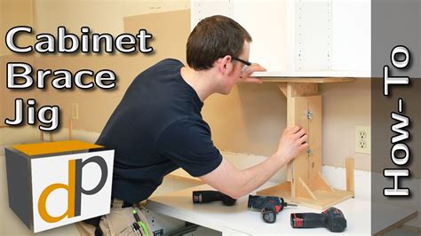 This way, the base cabinets are not in your way during the necessary lifting and fastening. Hang Upper Cabinets by Yourself - Cabinet Brace How-To ...