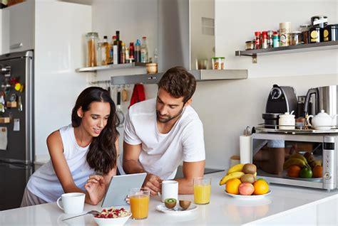 Morning Bonding Time For The Modern Couple Stock Photo Download Image