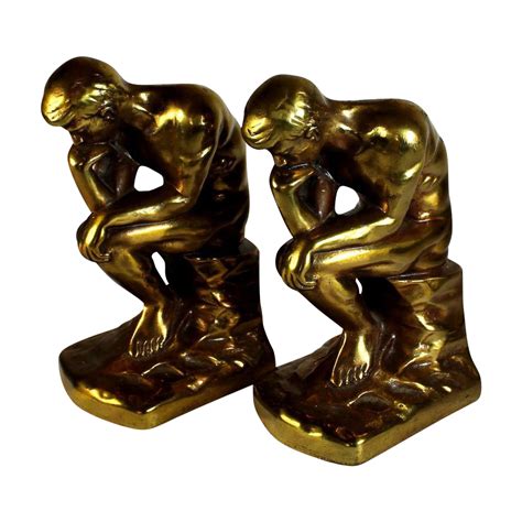 Gold metal sculptural thinker bookends from julietjonesvintage on Ruby Lane