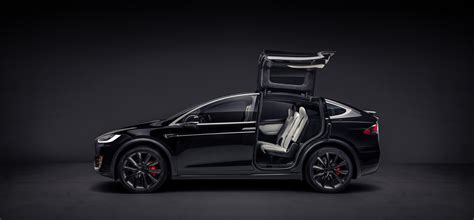 Tesla model x long range i рестайлинг. 2019 Tesla Model X black color open door black background ...