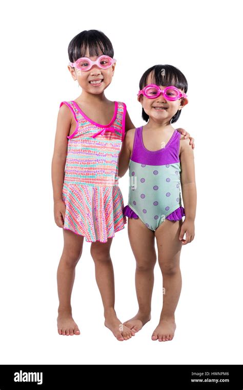 Asian Chinese Little Sister Portrait Wearing Goggles And Swimsuit In Isolated White Background