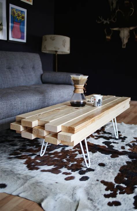 A large and in charge coffee table that has a cool and stylish industrial feeling to it. DIY Wooden Coffee Table - A Beautiful Mess