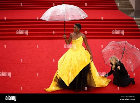 Lashana Lynch Poses For Photographers As She Attends The World Premiere Of The New James Bond