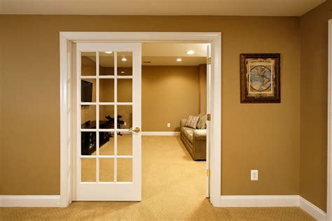 Choose the eastern door on the higher level of the main hall. Ashburn Basement 1 - Traditional - Basement - DC Metro - by Blue Moon Construction