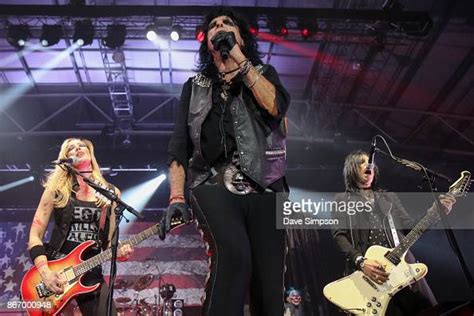 Musicians Nita Strauss Alice Cooper And Tommy Henriksen Perform At
