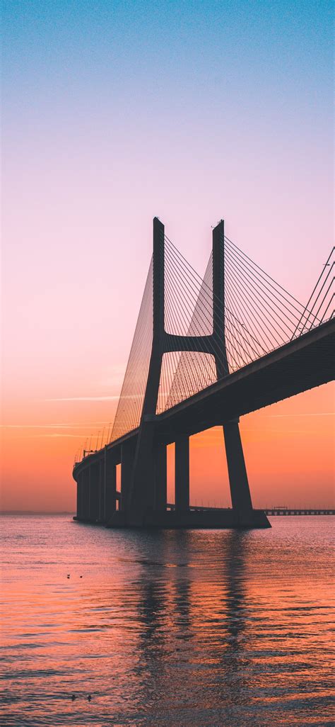Silhouette Of Bridge Under Clear Sky Iphone X Wallpapers Free Download