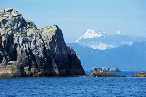 Rock And Mountain Over Ocean Stock Photo Image Of Rock Ocean 20297988