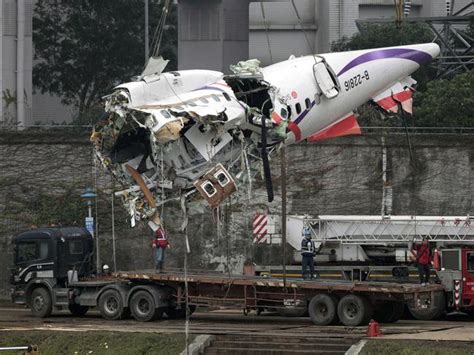 Taiwan Plane Crash Pilots Body Found Holding The Joystick