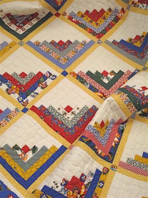 Scrappy quarter log cabin quilt and tutorial. http://hollyhillquiltshoppe good idea for french Provence ...