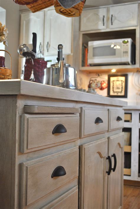 Oak cabinets are durable and can be stained to match a variety of interiors. Awesome Whitewash Kitchen Cabinets 28 In Home Decorating ...