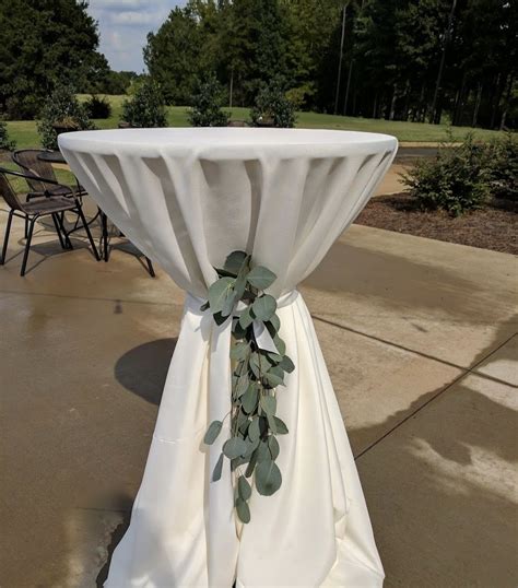 With Eucalyptus Greenery Tied Tablecloth Wedding Centerpieces Wedding Table Diy Wedding