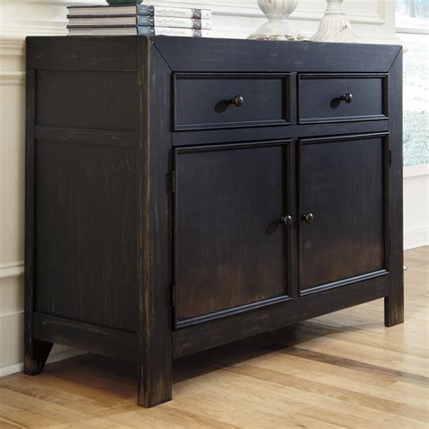 Signature Design By Ashley Gavelston Distressed Black Accent Cabinet