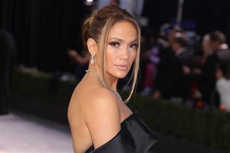 jennifer lopez shows off a sexy take on formalwear in her latest shoe campaign