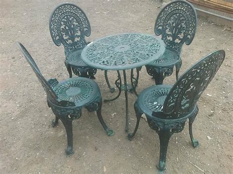 Patio table materials choose a patio table made from a material that suits your taste as well as your local climate. Lovely vintage very ornate cast metal bistro table and 4 ...