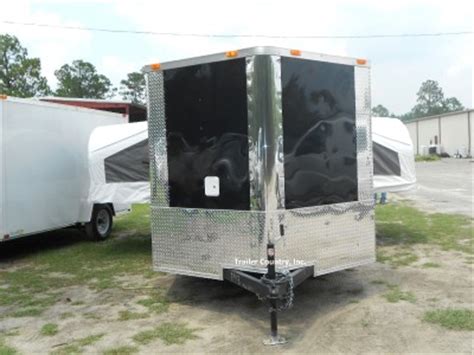 Pop up campers, also known as folding campers, are compact units that feature canvas sides that can be unfolded to reveal additional living space. 7x16 7 x 16 SPORT ENCLOSED CARGO TRAILER W/ POP-OUT BED