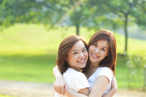 Two Asian Girls Having Fun Stock Image Image Of Happy 26159683