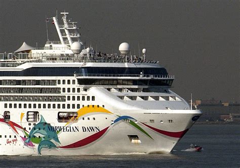 Cruise Ship Norwegian Dawn Returns After Wave Damage