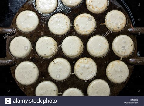 Homemade Dutch Poffertjes Baking In A Traditional Cast Iron Stock Photo
