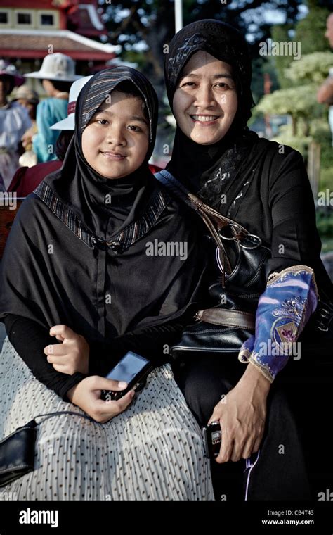 Muslim Mother And Daughter In Traditional Hijab Head Wear Thailand