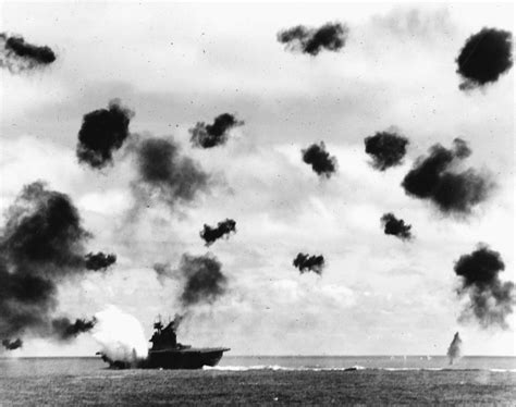uss yorktown being hit by a torpedo during world war ii battle of midway image free stock