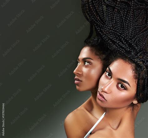 Beautiful African American Woman Is Reflected In A Mirror Mulatto Girl