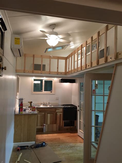 White Interior Tiny Housetiny Home With Lofts And Catwalk Built By