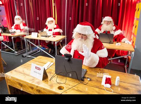 Whilst Dressed As Santas Hi Res Stock Photography And Images Alamy