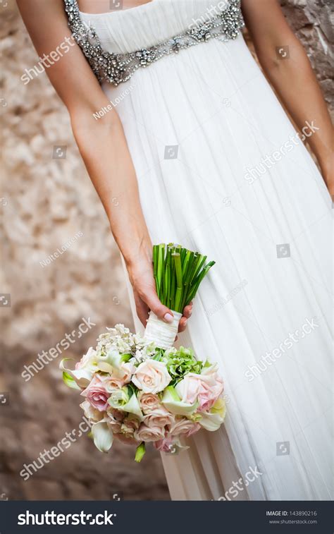 Simply turn the flower upside down and pour water into the open cavity of the stalk. Hold Bunch Flowers Upside Down : Elderly Woman Get A Beautiful Bouquet Of Field Flowers ...