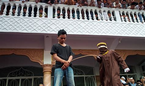 indonesia s aceh province debates public floggings for homosexuality world news the guardian