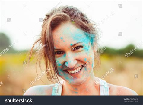Charming Woman Face Covered Blue Paint Stock Photo 589734692 Shutterstock
