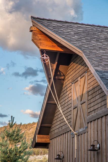 Roof is 16 feet by 33 feet , footprint is 14 feet by 24 feet , has a loft 12 feet by 14 feet. Brasada Ranch home barn style garage including rope pully to faux hay loft - Rustic - Exterior ...