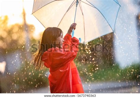 Asian Children Spreading Umbrellas Playing Rain Stock Photo Edit Now