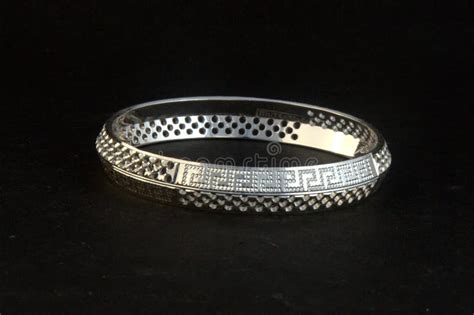 Silver Bangles And Gents Kade And X28 Hand Band And X29 Stock Image