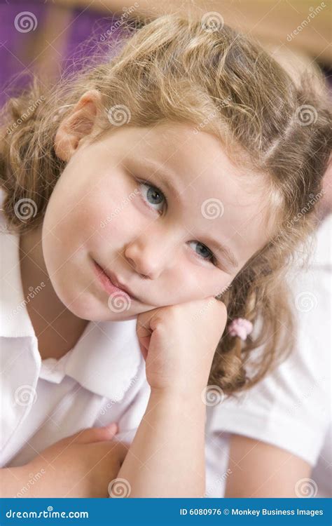 Bored Schoolgirl Sitting In Primary Class Stock Photo Image Of