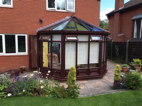 Low e glass low e glass has a microscopic metal coating which reflects the heat back into the room. Conservatory with 'self-cleaning' glass roof | Lymm ...