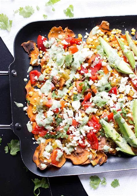 These are the absolute epitome of supreme loaded nachos… a mixture of tortilla and corn chips topped with tons of cheese and all of the best toppings you could imagine! Healthy Loaded Sweet Potato Nachos - Kiwi and Carrot