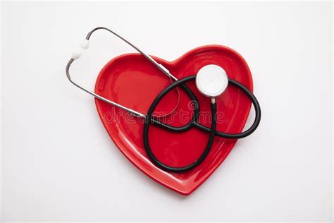 Red Heart Shape With A Stethoscope Healthy Heart Concept Stock Photo