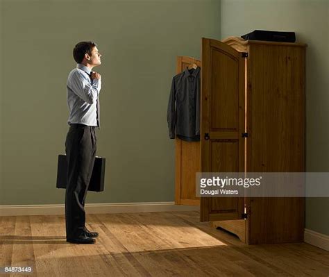 Man Opening Closet Photos And Premium High Res Pictures Getty Images