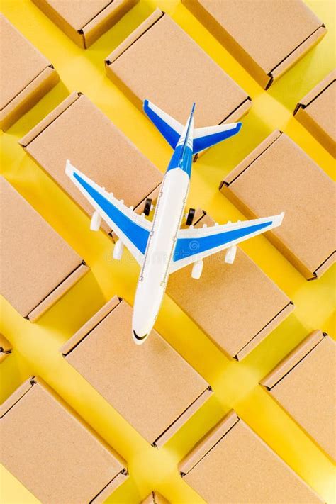 Airplane And Kraft Cardboard Boxes Fast Delivery Of Goods And Products